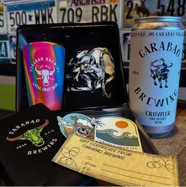 Carabao merch: a pint glass, crowler, koozie and gift certificate