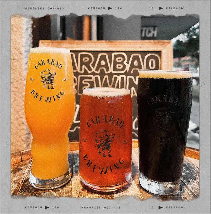 Three Carabao beers, light to dark, in branded glasses
