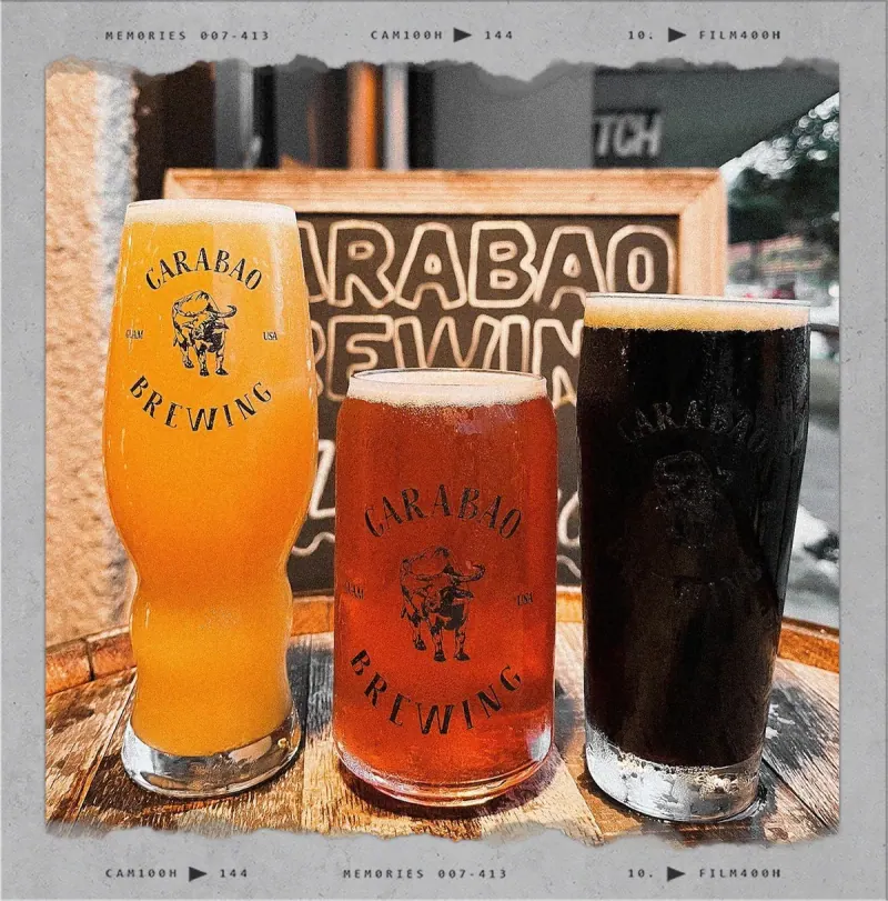 Three Carabao beers, light to dark, in branded glasses