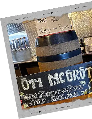 A chalkboard tap sign for Oti McGrot, a New Zealand style oat pale ale